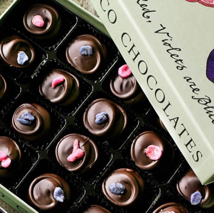 Rococo Chocolates London | Find the perfect birthday gift for them, next day delivery in the UK available. Picture of Dark Chocolate Rose and Violet Fondant Creams.