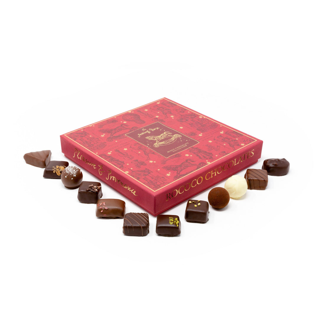 Best-selling festive chocolate selection box from Rococo Chocolates, filled with non-alcoholic white, milk, and dark chocolates.